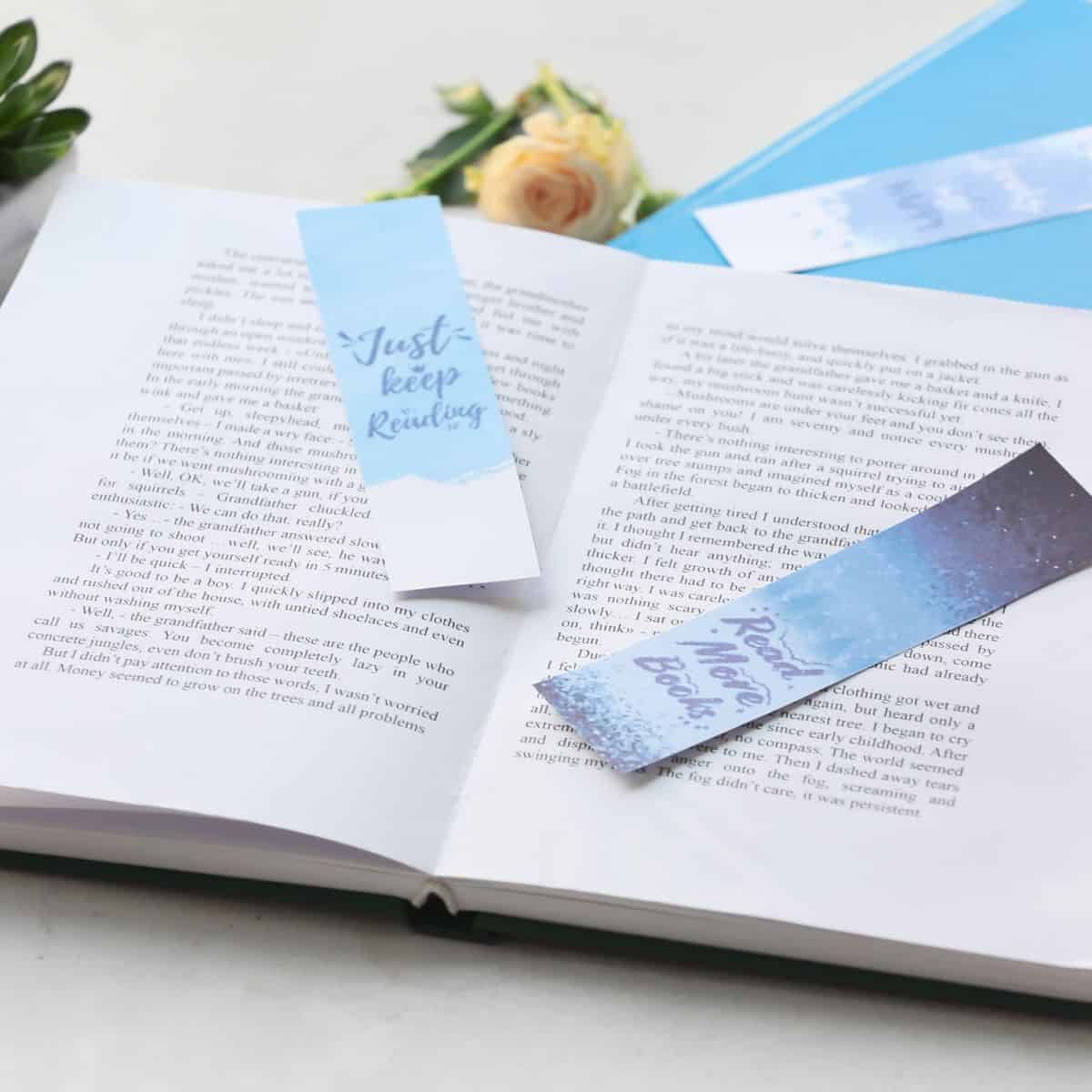 bookmarks with quotes and a book