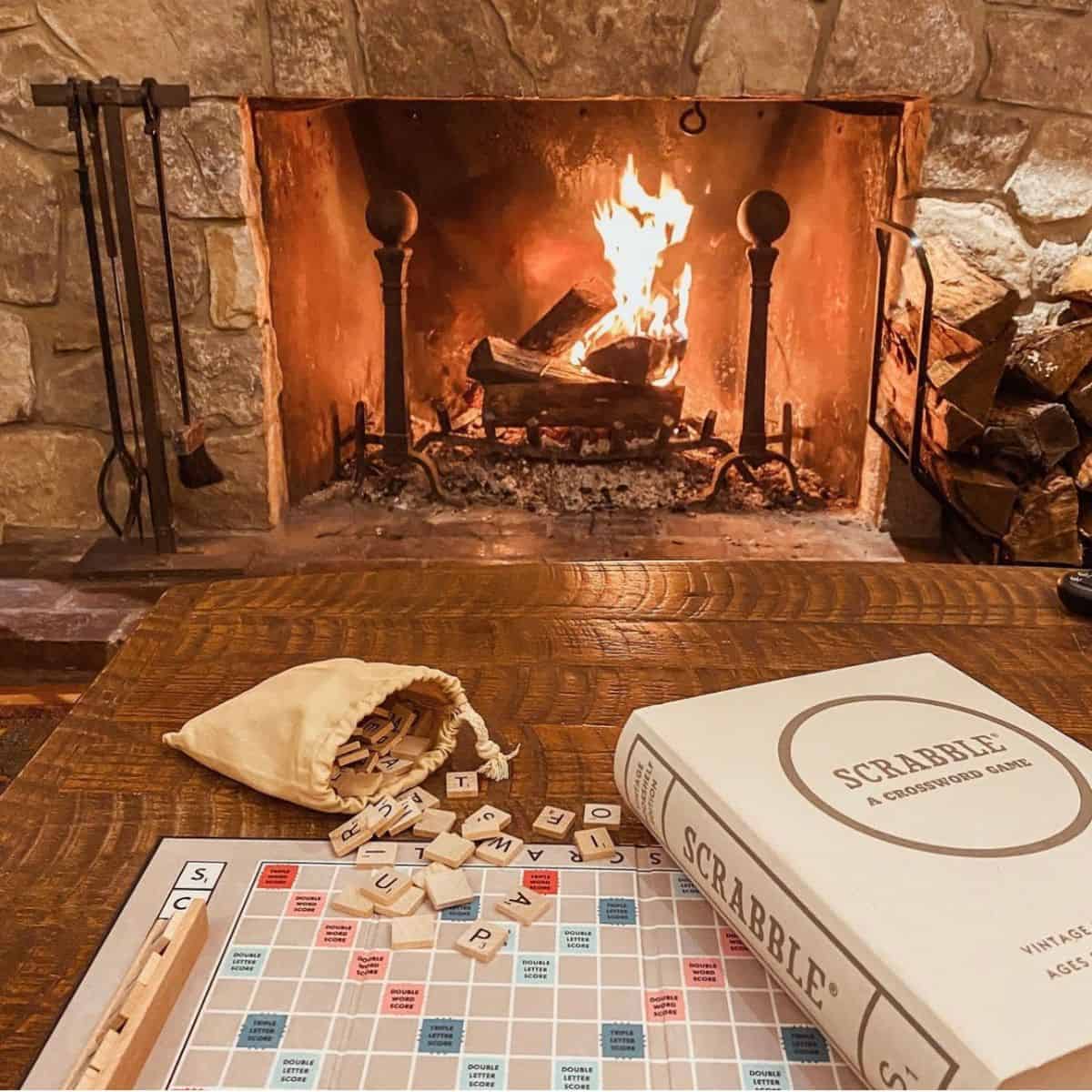playing scrabble by the fireplace