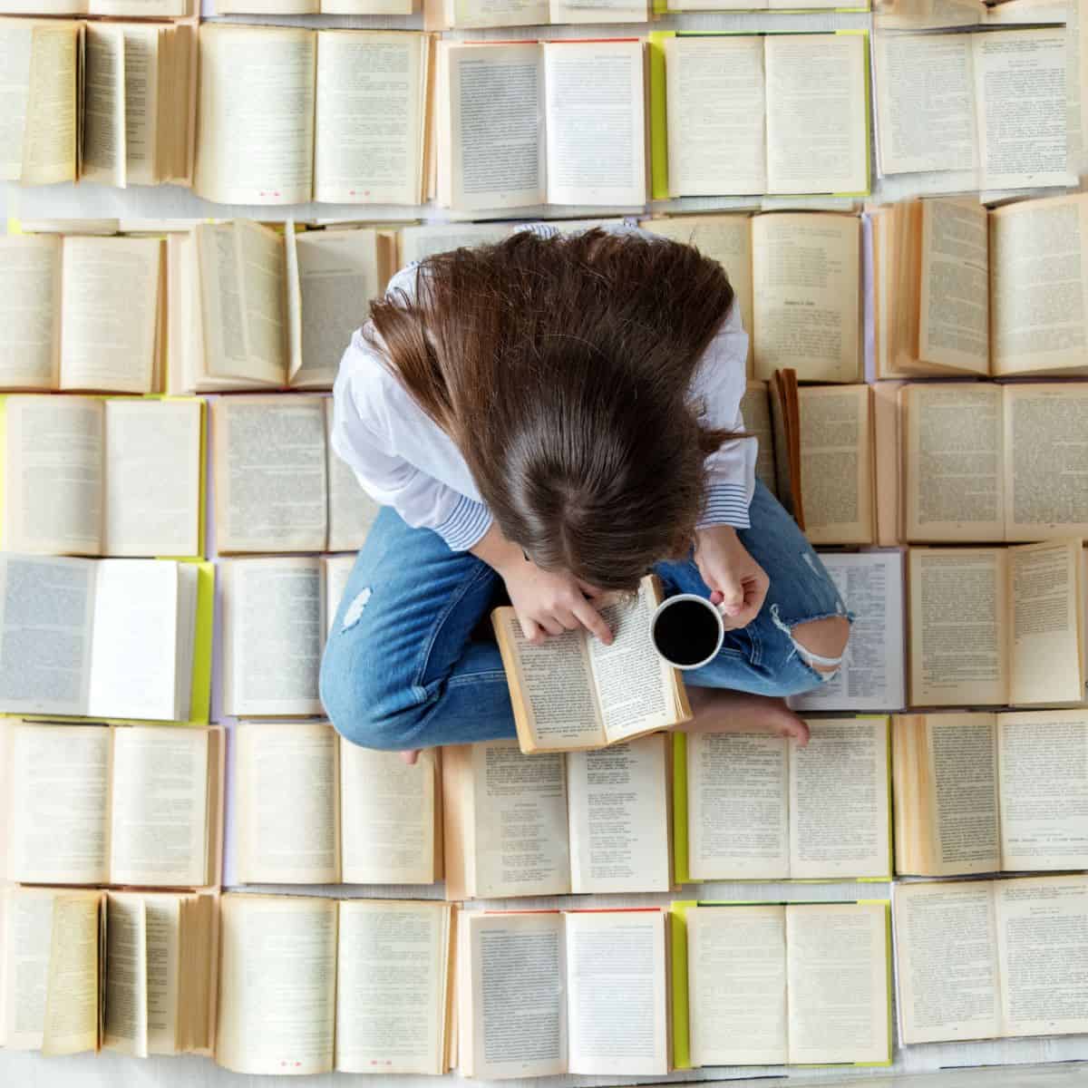 woman reading more than one book