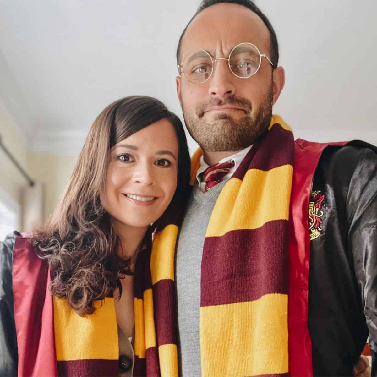 couple wearing harry potter and hermione granger costumes