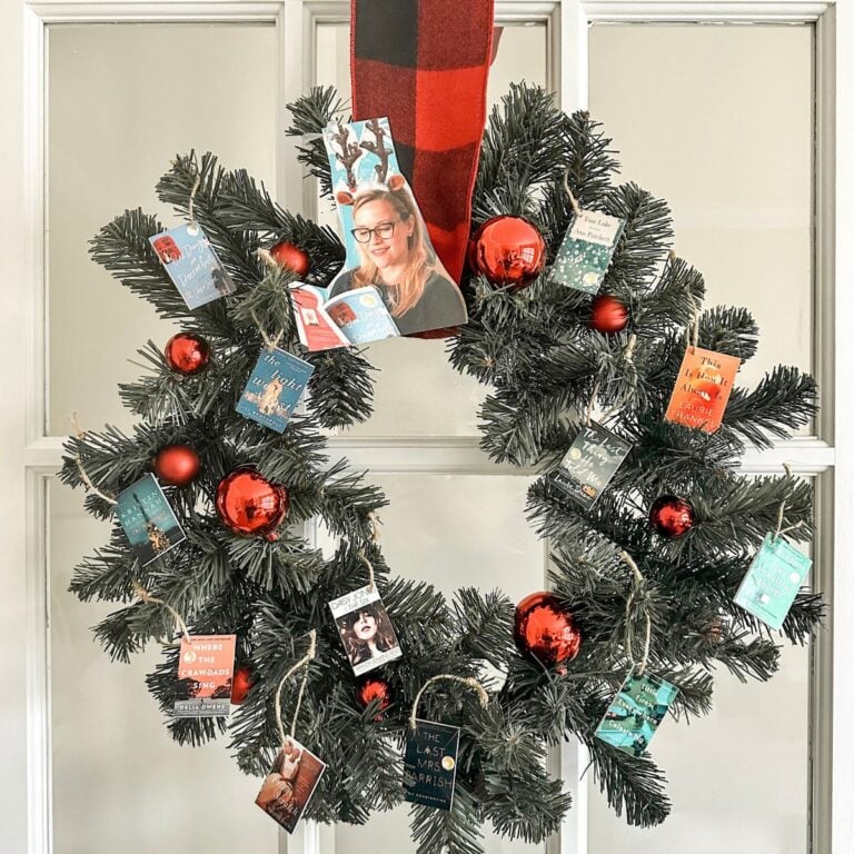 wreath decorated with reese witherspoon and ornaments of her book club picks.