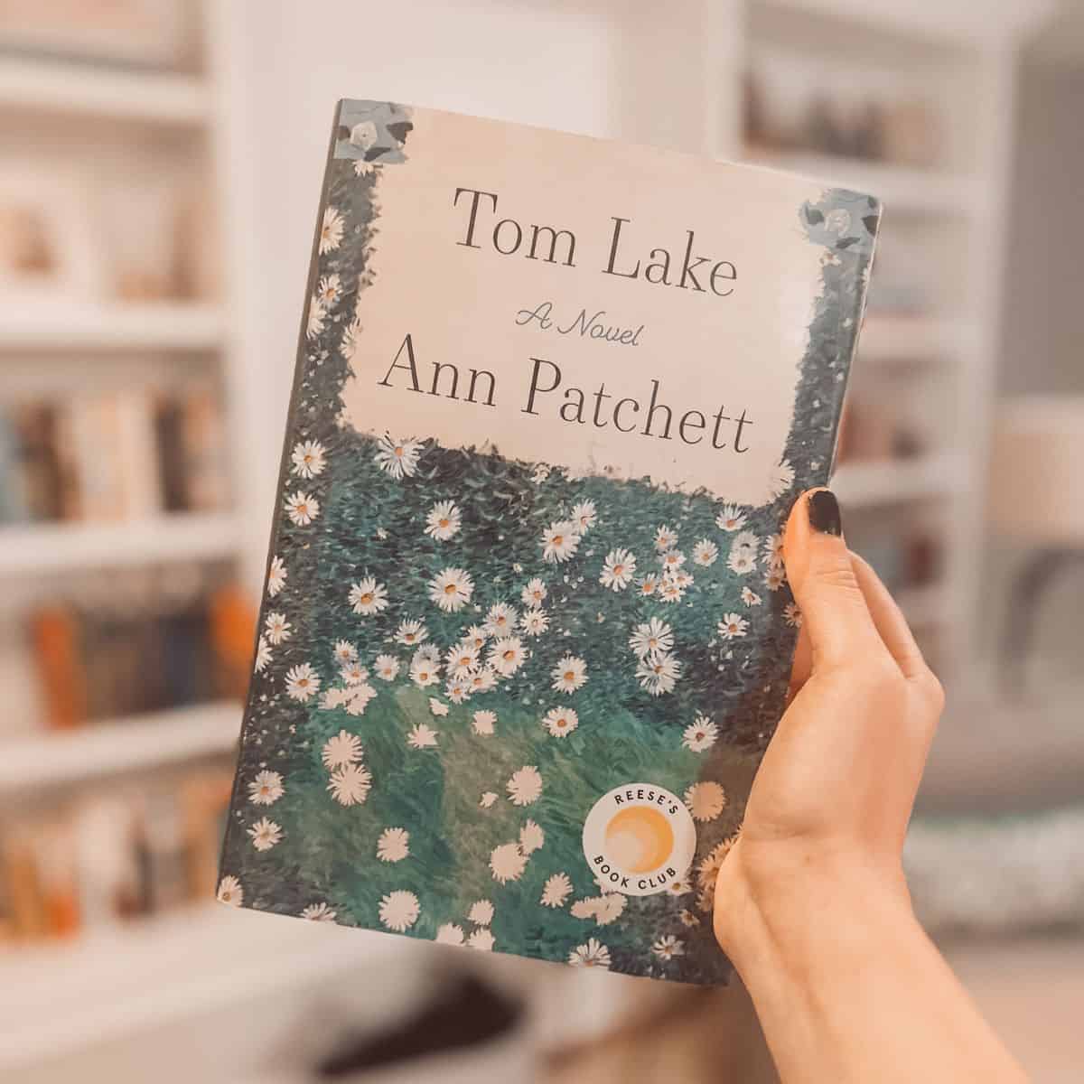 tom lake by ann patchett held up in a reading room.