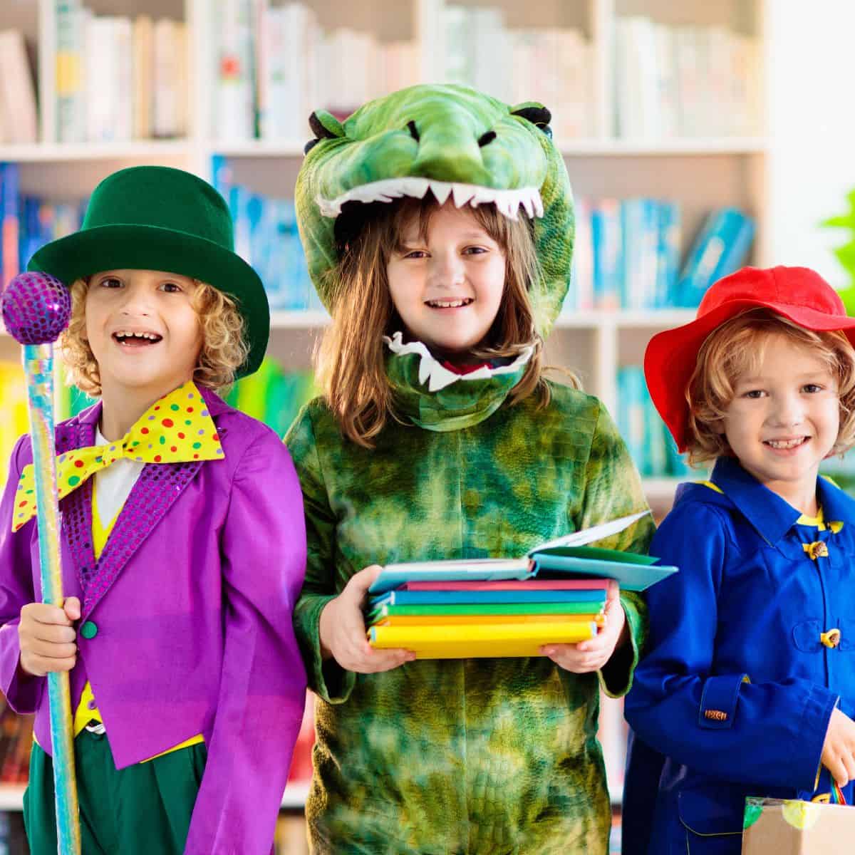 kids dressed as book characters holding books.